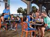 Families enjoy a meal at the oceanfront Town Center.