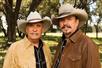 Bellamy Brothers in brown jackets and cowboy hats