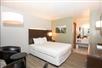 Guestroom - Fall Creek Inn & Suites in Branson, Missouri