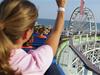 Passengers enjoy the view of Myrtle Beach while on the Swamp Fox Coaster ride.