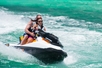 Riders making some waves as they cruise through the ocean waters on the Fury Water Adventure Ultimate Jet Ski Tour of Key West in Key West, Florida.