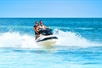 A couple of people on a Jetski in the ocean on the Fury Water Adventure Ultimate Jet Ski Tour of Key West in Key West, Florida.