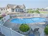 Enjoy a swim in our convenient outdoor pool. - Gazebo Inn in Branson, MO