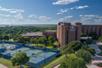 View of the hotel and sports courts at Hilton DFW Lakes Executive Conference Center, TX.