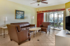Living area, sofa, flat-screen TV at Hilton Vacation Club Mystic Dunes Orlando, FL. 