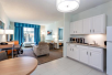 Living area, sofa bed, kitchenette at Holiday Inn - St Augustine - World Golf, an IHG Hotel, FL.  
