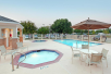 Outdoor Pool and Hot Tub at Holiday Inn Express Hotel and Suites DFW-Grapevine, an IHG Hotel, TX.