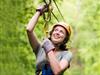 Soar through the air with Legacy Mountain Premier Ziplines.