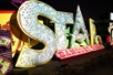 Signs see on the NEON Night Flight Spectacular in Las Vegas Nevada.