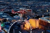 The helicopter with the city in the background on the NEON Night Flight Spectacular in Las Vegas Nevada.