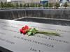 A rose on a plaque at the 9/11 memorial on the 9/11 Memorial Tour with Priority Entrance Observatory Ticket in New York City, New York, USA.