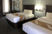 2 Queen beds at Quality Inn & Suites Miramar Beach, FL.