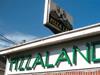 The Pizzaland sign on a sunny day on the Sopranos Sites in New YorkCity, New York, USA.