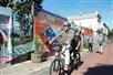 Biking through mural alley.