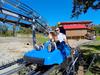 Dad and Son on Runaway Mountain Coaster in Branson, Missouri