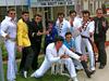 Elvis tribute artists pose in front of Dick Clark's American Bandstand Theater.