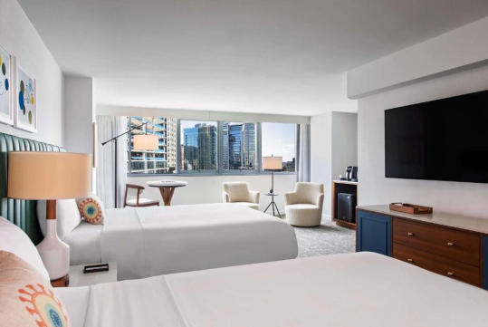 2 Queen beds, flat-screen TV, seating area at Royal Sonesta Chicago Downtown, IL.